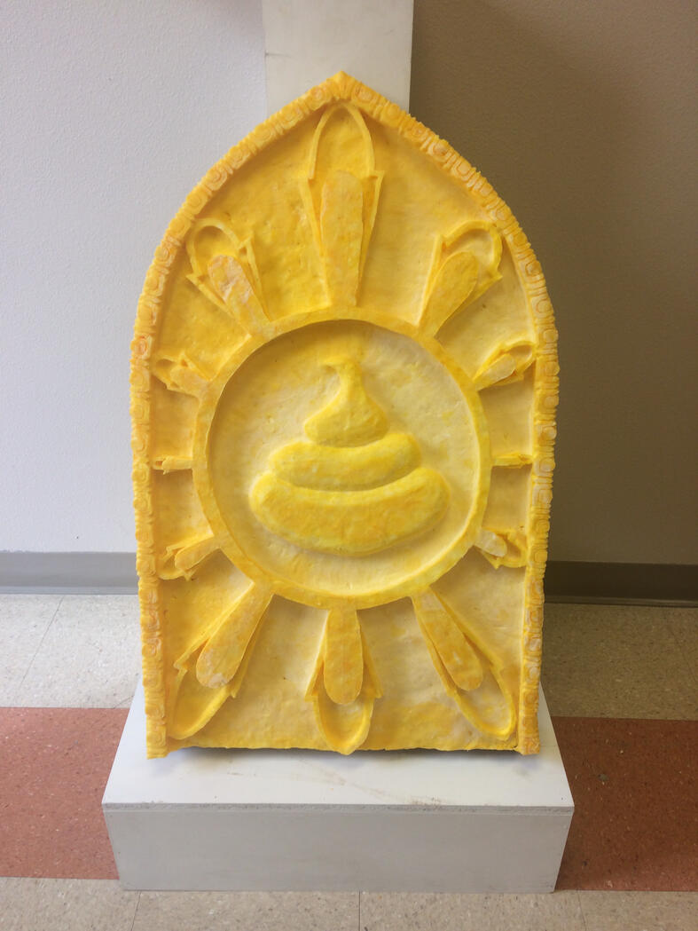 "Caca De Los Santos" Carved ivory soap dyed yellow. 18" by 24", you might see this massive brick of soap and think, "holy shit!"